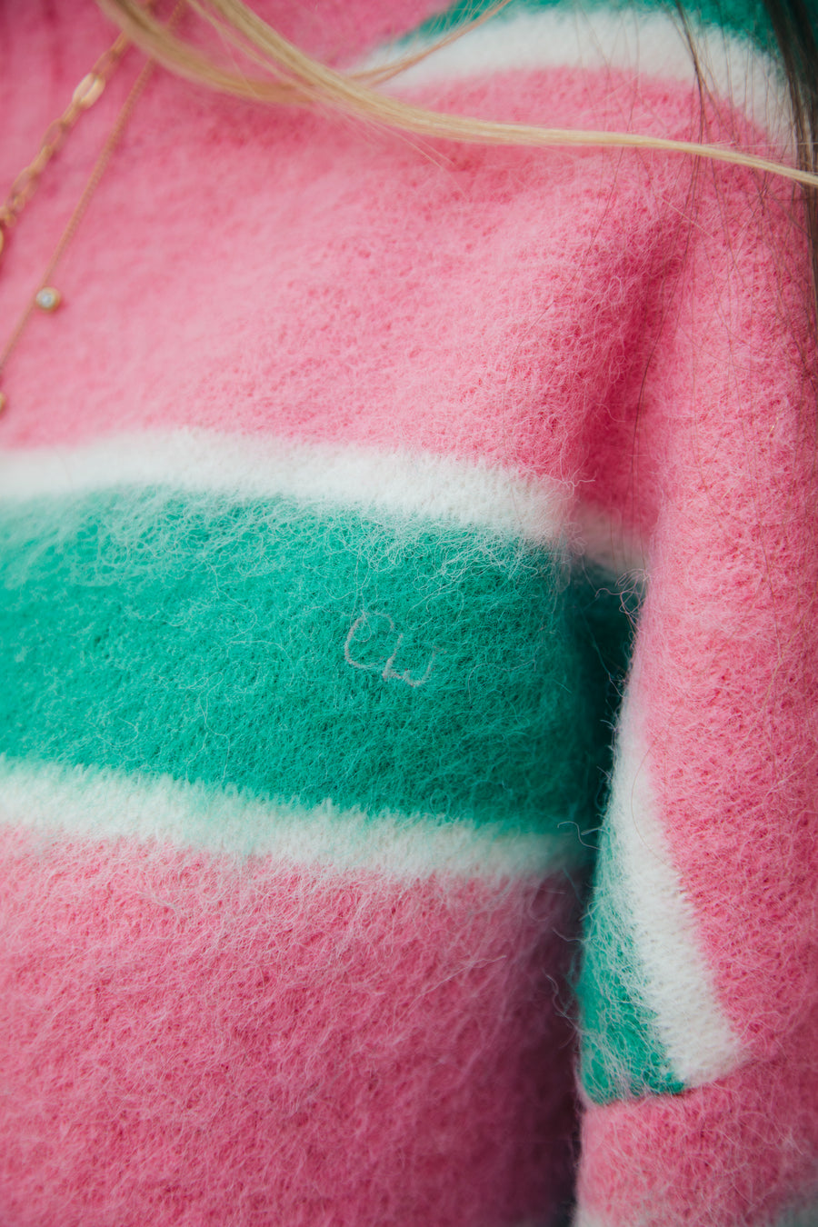 Close up photo of the The Pembridge Jumper's logo detail